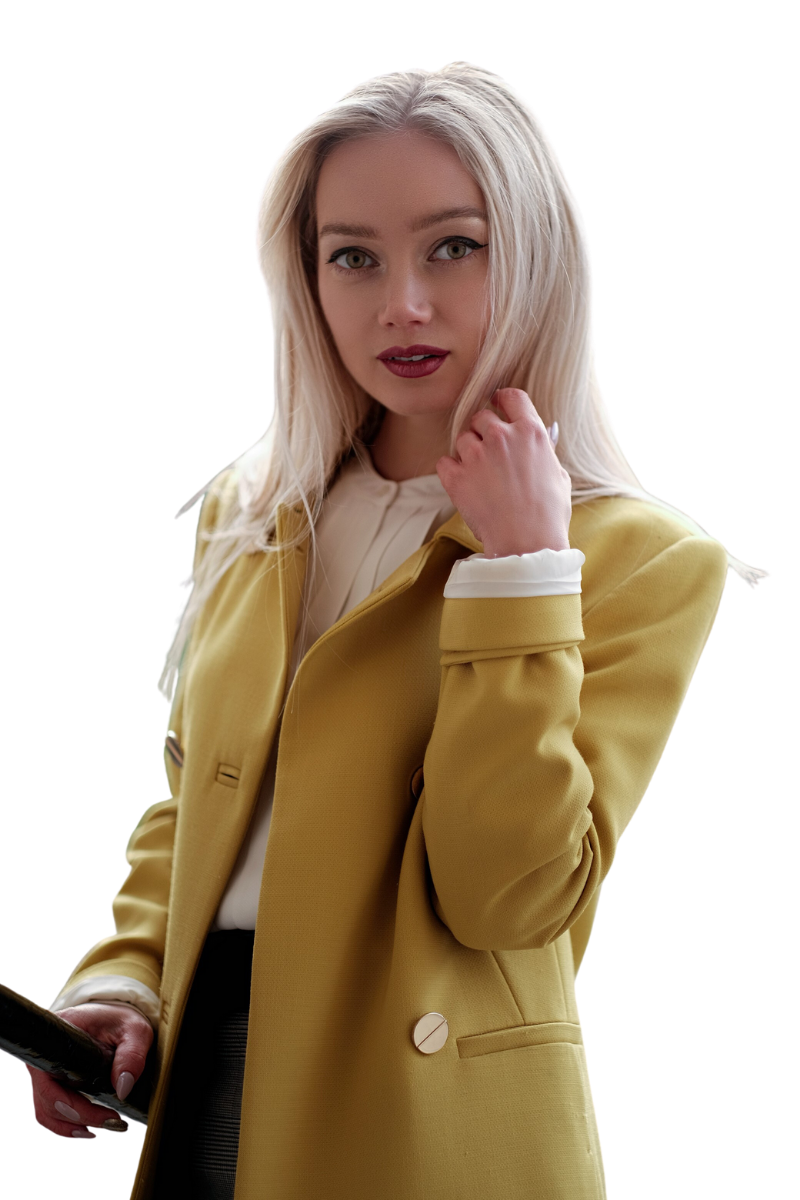 Blonde woman wearing a citrus lemon jacket, holding a mobile phone